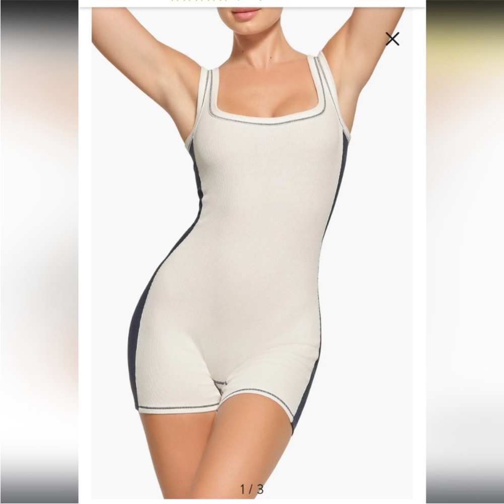 SKIMS Cream and Black Ribbed Tank Romper